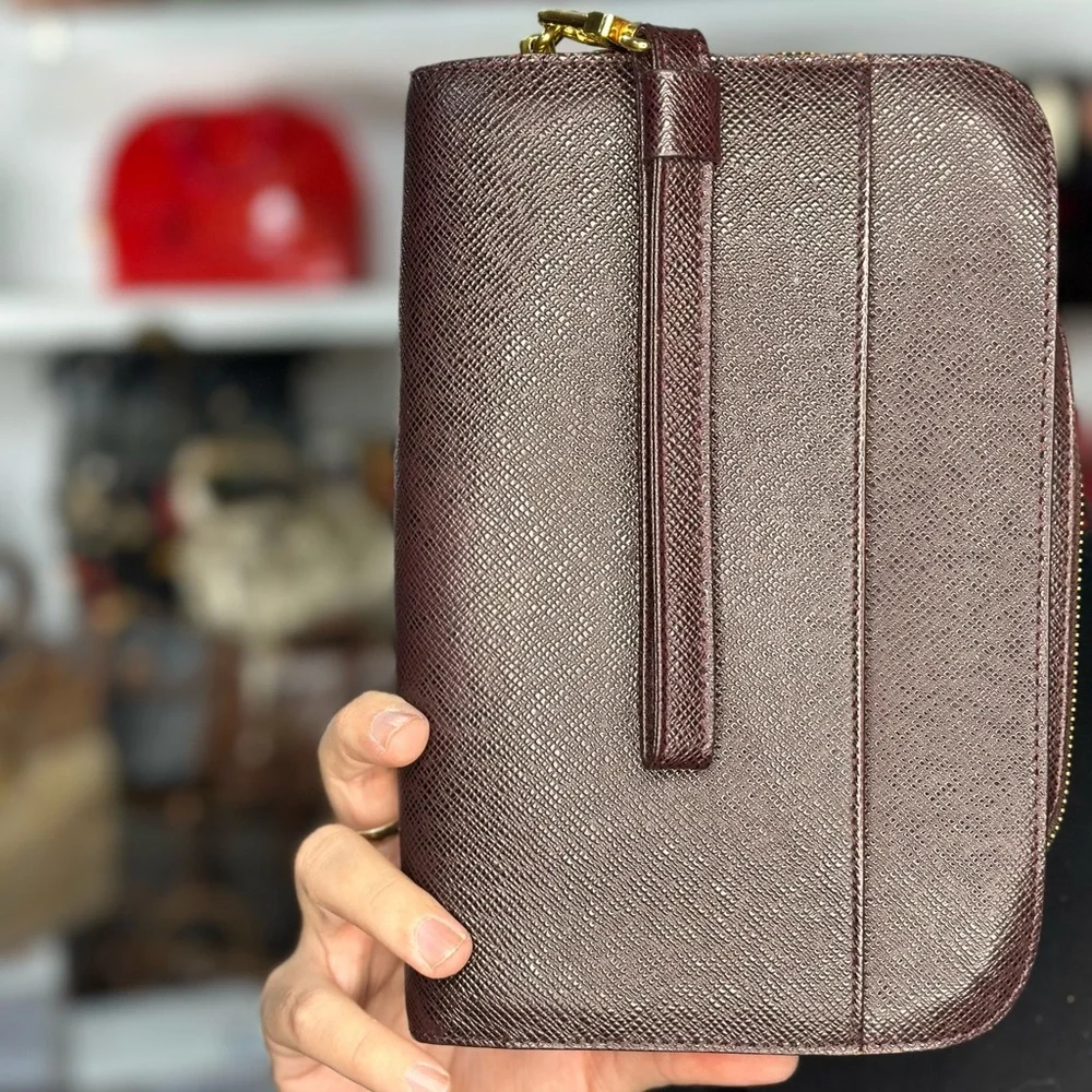 LV Taiga Leather Wristlet